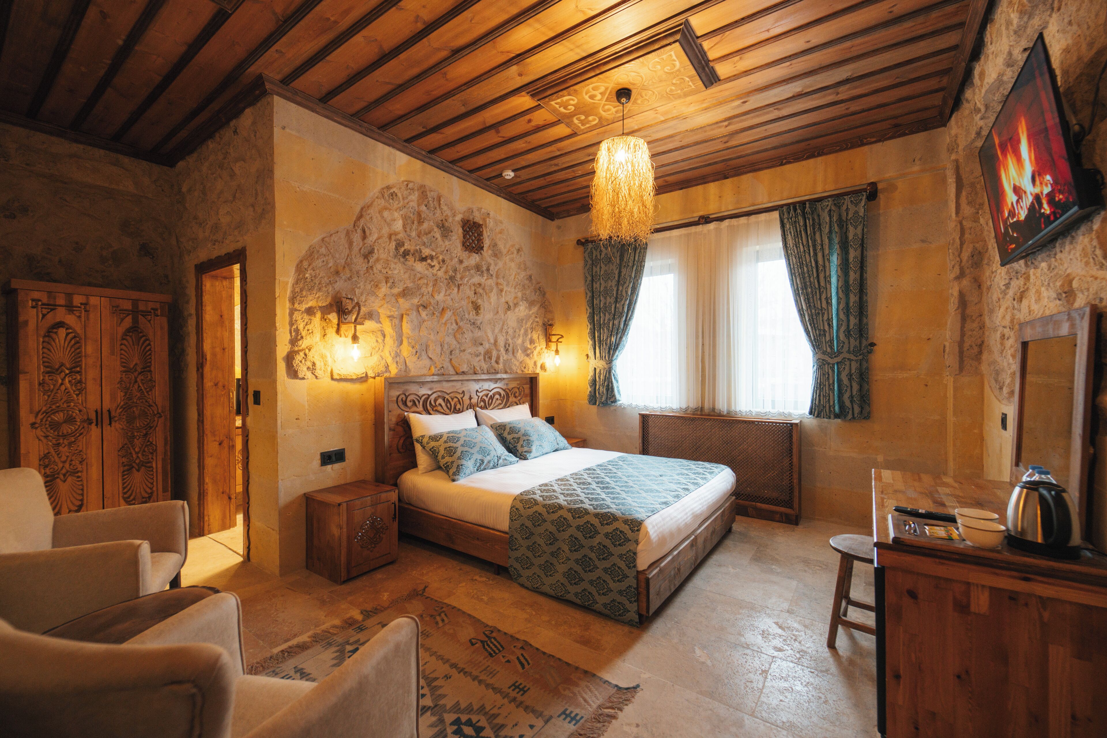 Quarto standard | Roupas de cama premium, frigobar (abastecido com alguns itens grátis)