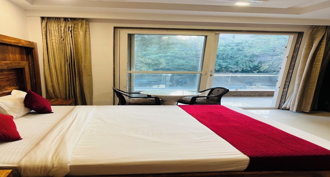 Deluxe Double Room, Balcony, City View | Desk, laptop workspace, free WiFi