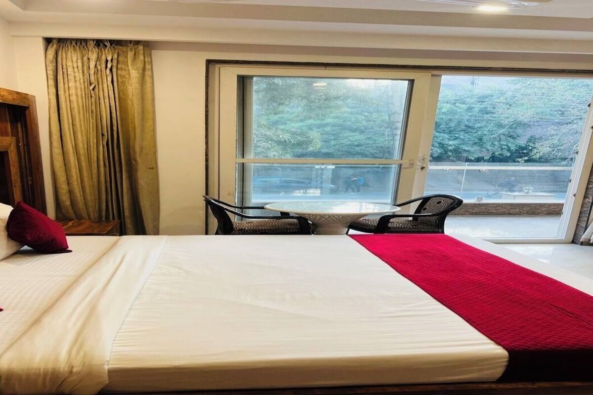 Deluxe Double Room, Balcony, City View | Desk, laptop workspace, free WiFi