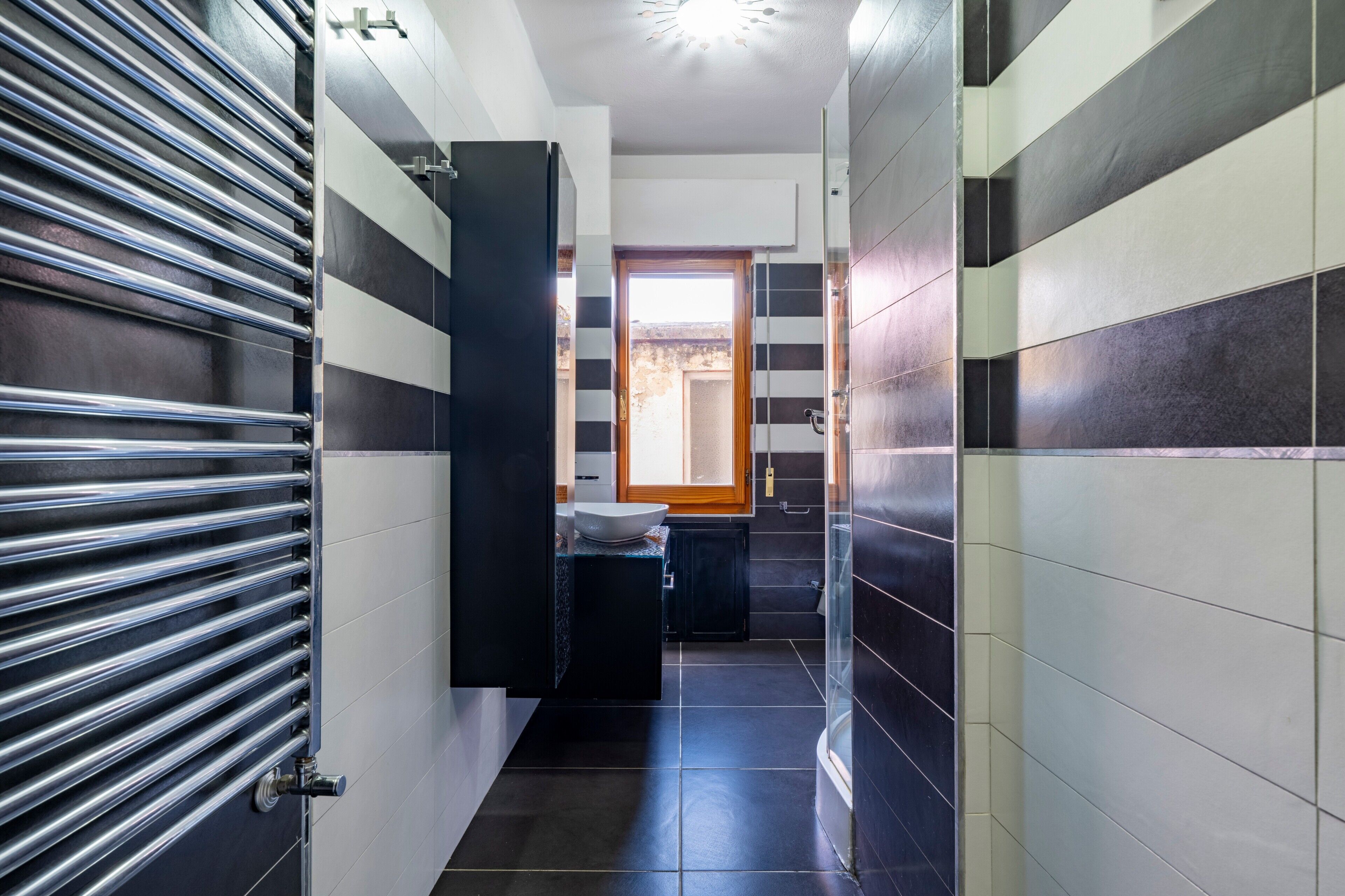 Dutxa, assecador de cabells i tovalloles 