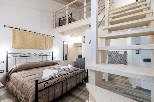 Chambre d’hôtes « Camera Nuraghe Ruggiu » avec terrasse privée, Wi-Fi et climatisation