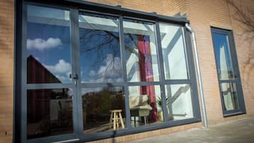 Luxury Studio, 1 King Bed, Kitchenette, Garden View | Blackout curtains, soundproofing, iron/ironing board, free WiFi