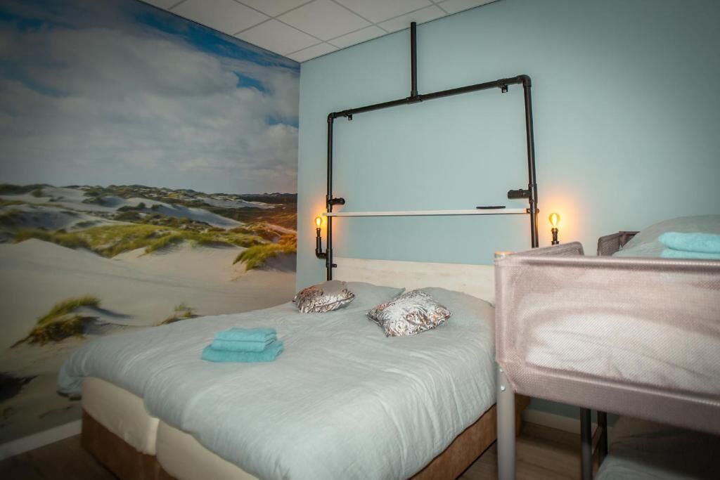 Family Studio, Multiple Beds, Pets Allowed, Garden View | Blackout drapes, soundproofing, iron/ironing board, free WiFi