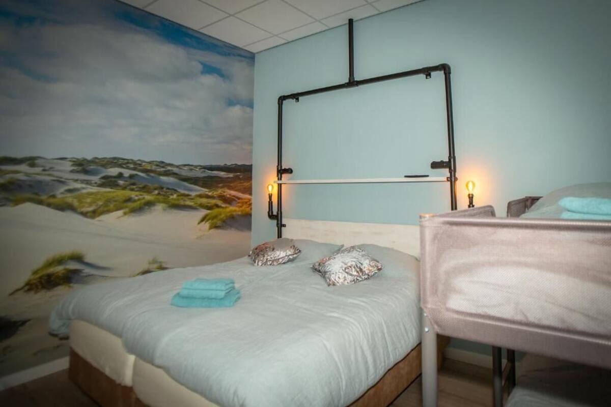 Family Studio, Multiple Beds, Pets Allowed, Garden View | Blackout drapes, soundproofing, iron/ironing board, free WiFi