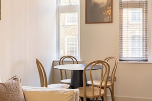 Dining - A calm, design-led Soho apartment with quiet bedrooms, air-con and smart TVs throughout. (London)