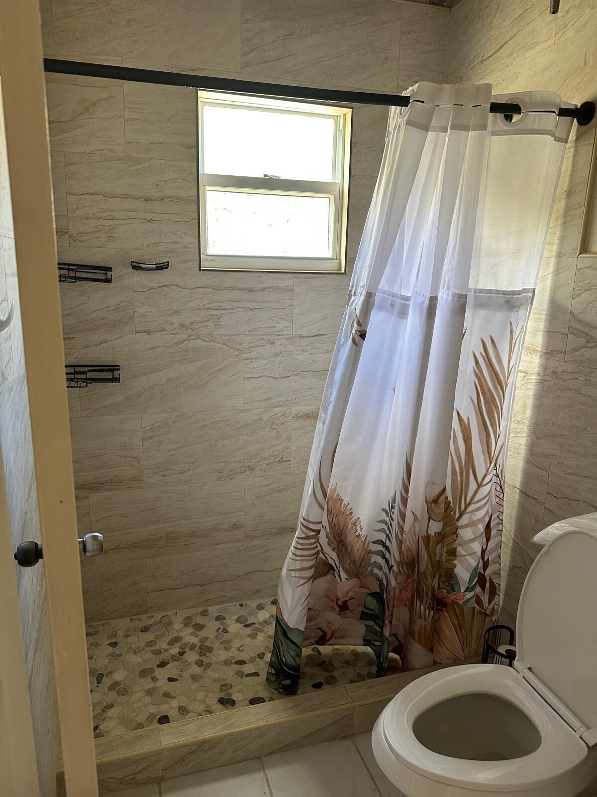 Shower, towels, soap, toilet paper