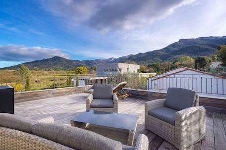 Terrace/patio. Guest Room “Suite Bougainvillier - Fleur de Lys” with Mountain View, Wi-Fi & Air Conditioning