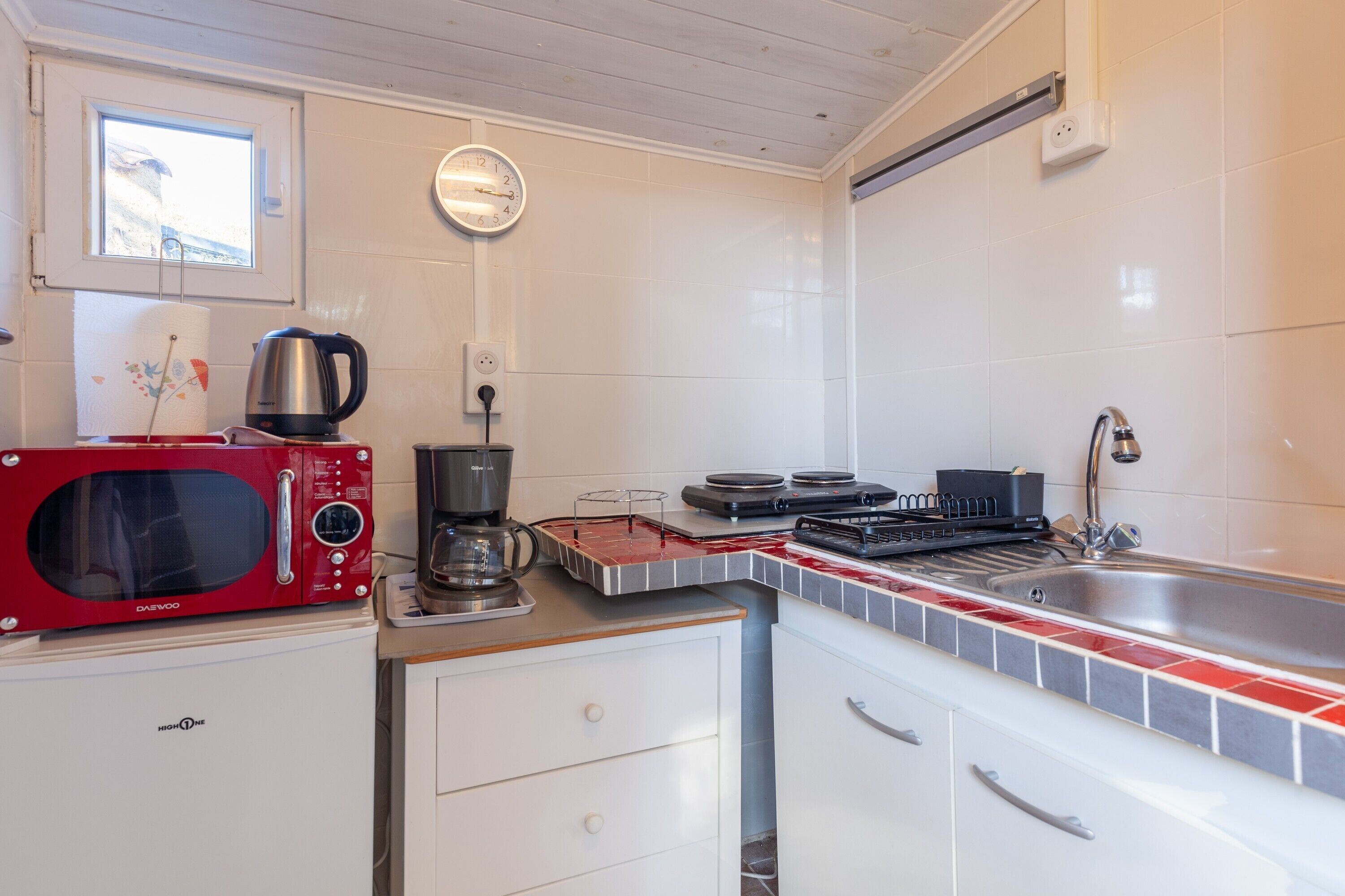 Fridge, microwave, stovetop, coffee/tea maker