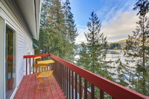 Property grounds - Book your next Bayview getaway at this 2-bedroom, 3-bath lakefront retreat on Lake Pend Oreille! Designed for relaxation and adventure, this home features cozy living spaces, a spacious deck with a hot tub, and stunning water and mountain views. (Bayview)