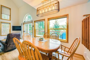 Dining - Book your next Bayview getaway at this 2-bedroom, 3-bath lakefront retreat on Lake Pend Oreille! Designed for relaxation and adventure, this home features cozy living spaces, a spacious deck with a hot tub, and stunning water and mountain views. (Bayview)