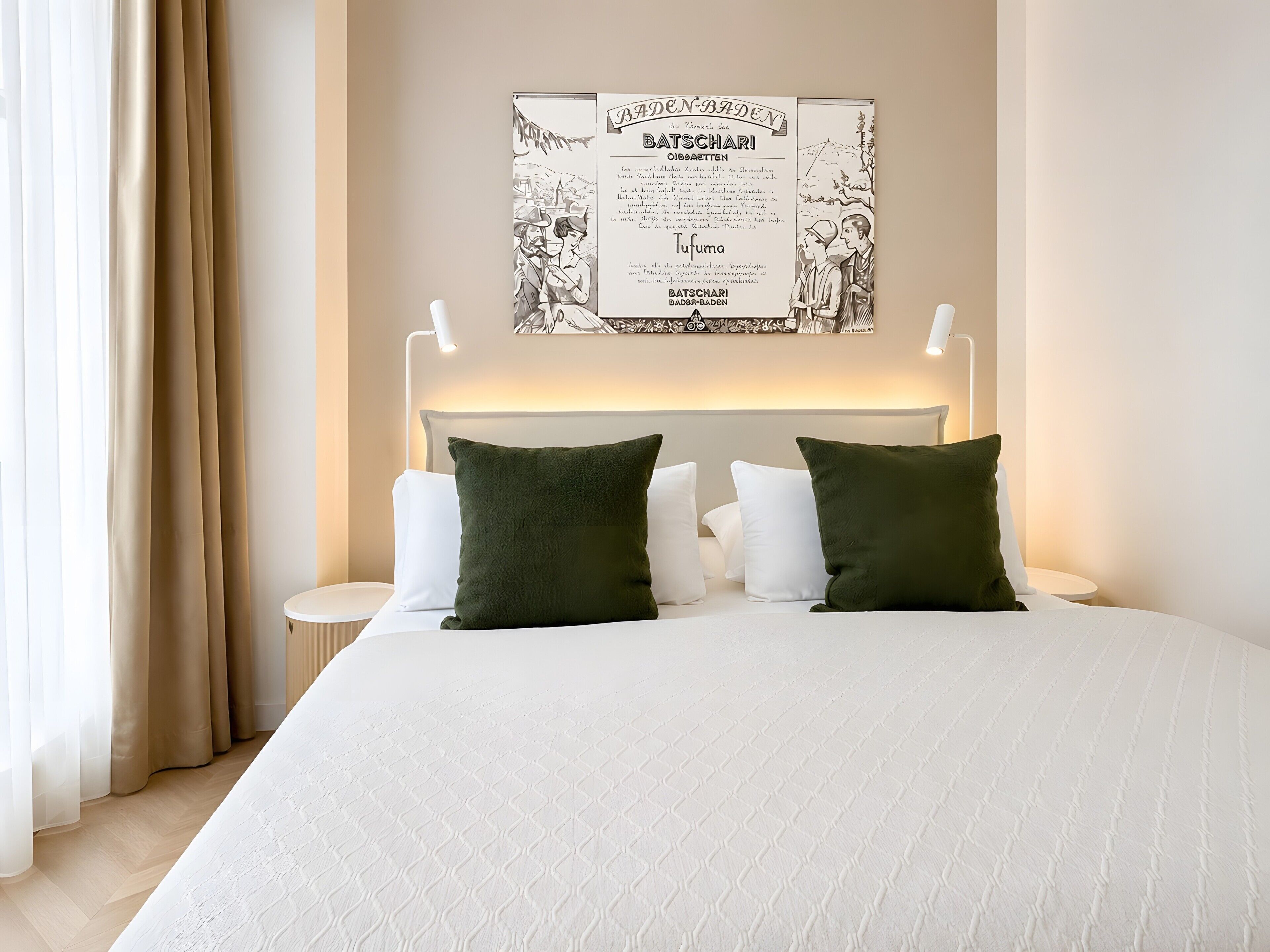 A hotel room with a bed, two bedside lamps, a wall-mounted artwork, and a window with curtains.