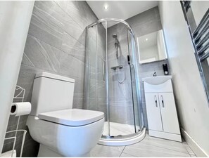 Shower, towels, soap, shampoo