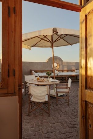 Outdoor dining. Historic House at the heart of Esna's city center, steps away from Khnum Temple.