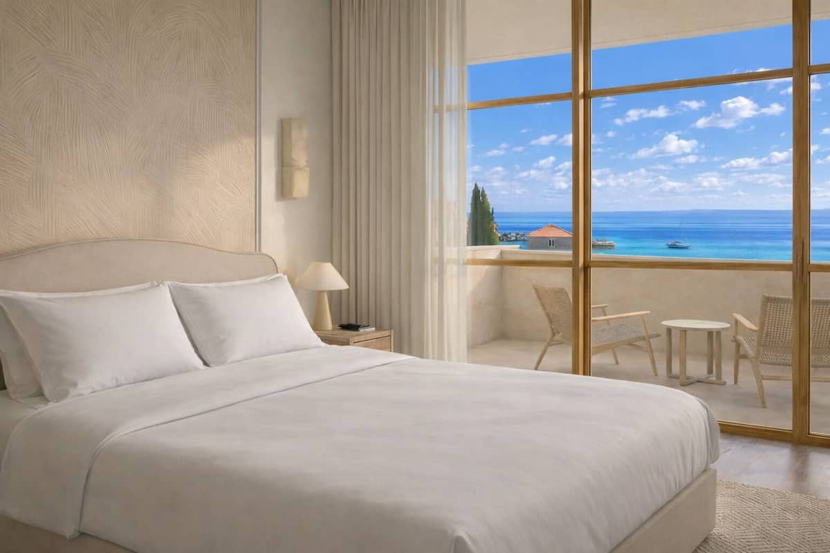 Suite Deluxe, vue mer | Articles gratuits dans le mini-bar, coffres-forts dans les chambres