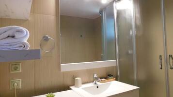 Shower, free toiletries, hair dryer, bathrobes