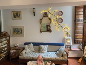 Apartment, 1 Bedroom, Smoking, Mountain View | Living room | Books - Casa Laura - Nature and Art Near Florence (Rufina)