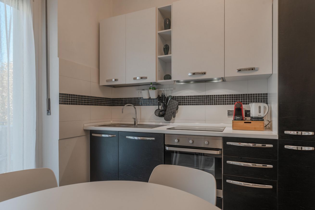 Frigorifero, microonde, forno, piano cottura