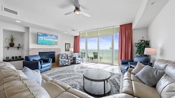 Signature Condo, 3 Bedrooms, Balcony, Beach View | Living room | 65-inch Smart TV with satellite channels
