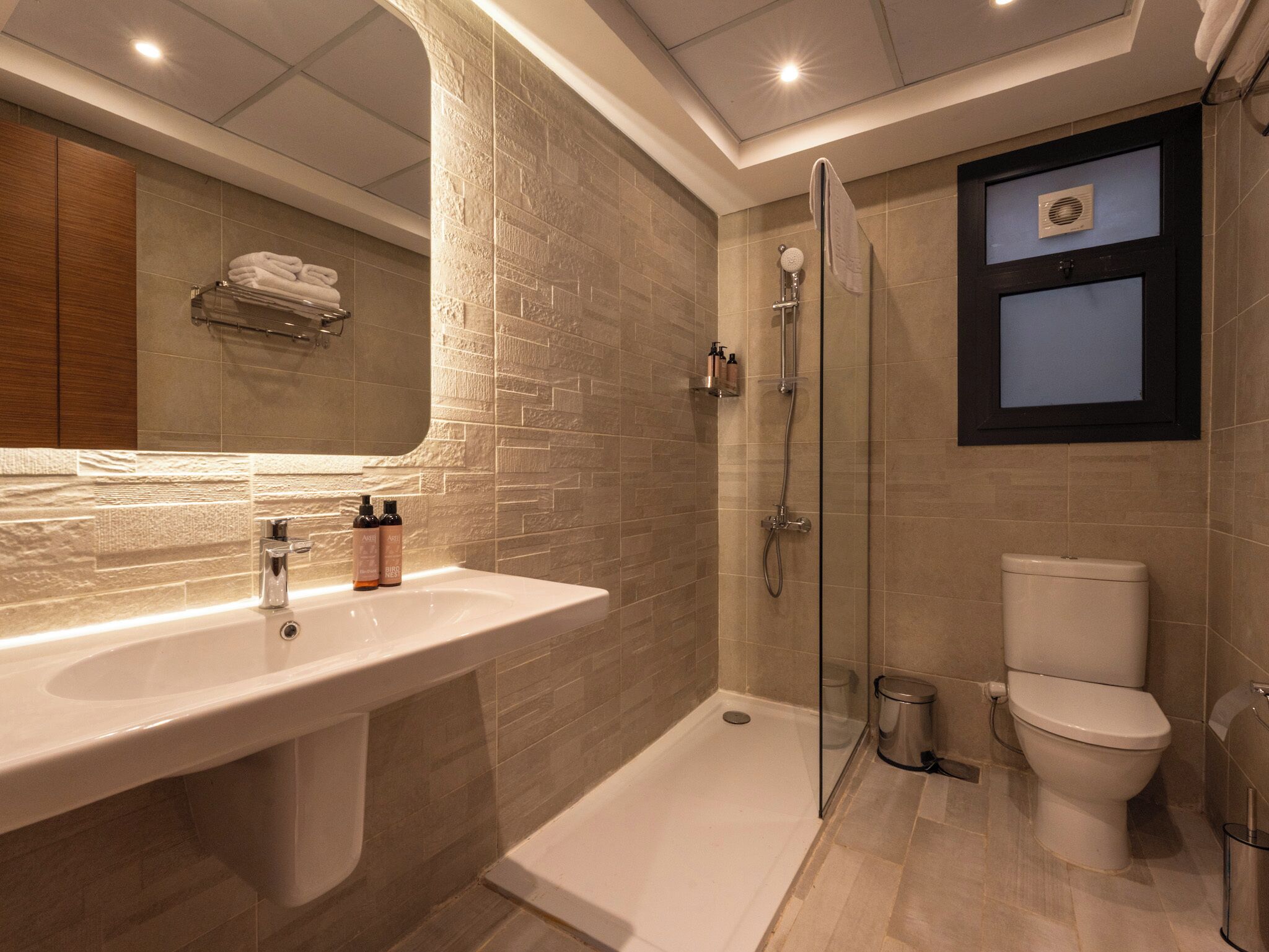 Shower, towels, soap, shampoo