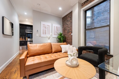 Charming Upper West Side apartment with exposed brick and in-unit washer/dryer.