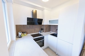 Réfrigérateur, four, plaque de cuisson, lave-vaisselle