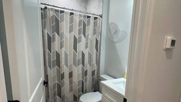 Hair dryer, towels, soap, shampoo