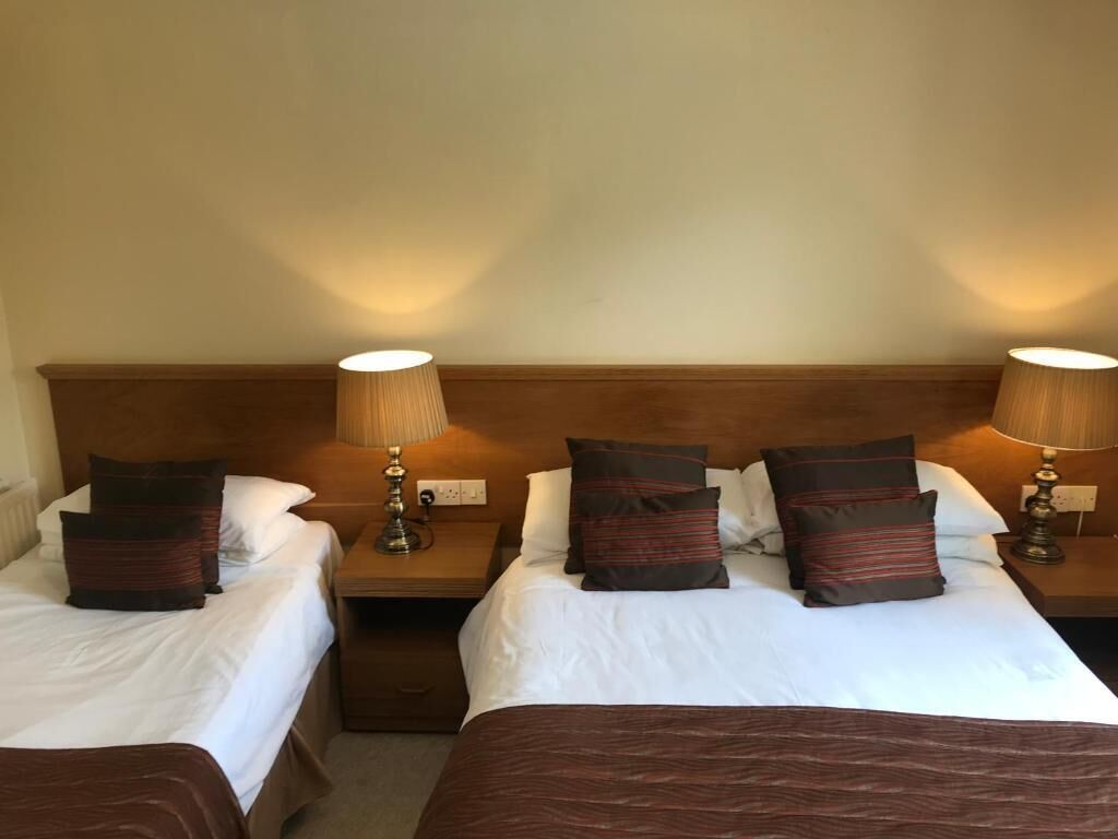 Deluxe Triple Room, Park View | Desk, laptop workspace, free WiFi