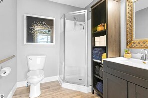 Shower, towels, soap, toilet paper