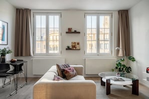 Apartamento, vistas a la ciudad | Zona de estar