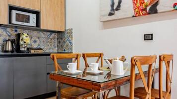 Luxury Suite, 1 Double Bed with Sofa bed, Private Bathroom, City View | Dining