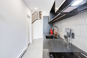 Full-size fridge, microwave, stovetop, espresso maker