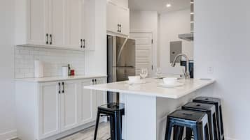 Full-size fridge, microwave, stovetop, espresso maker