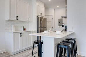 Full-size fridge, microwave, stovetop, espresso maker