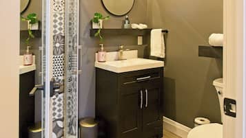 Bathroom | Shower, free toiletries, hair dryer, towels