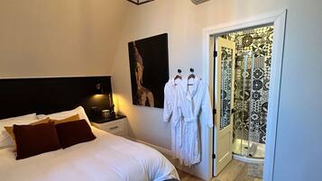 Habitación de lujo | Cortinas opacas y sistema de insonorización