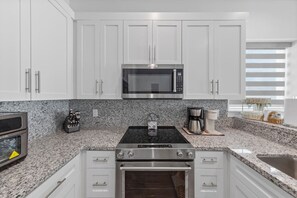 Private kitchen - Sunset Haven – Stunning Lagoon & Private Boat Dock (South Padre Island)