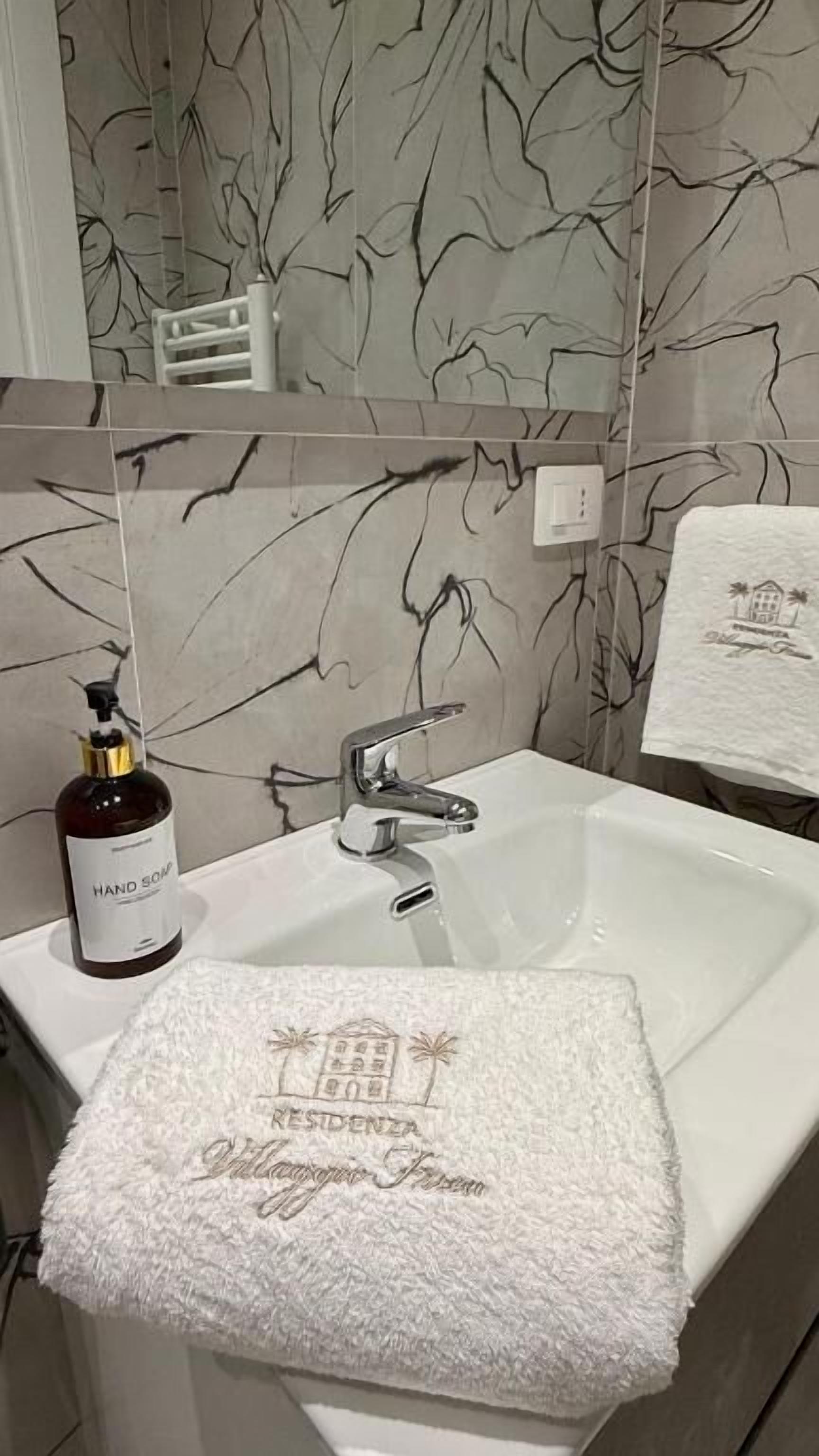 Double Room, Courtyard View | Bathroom | Shower, hair dryer, slippers, towels
