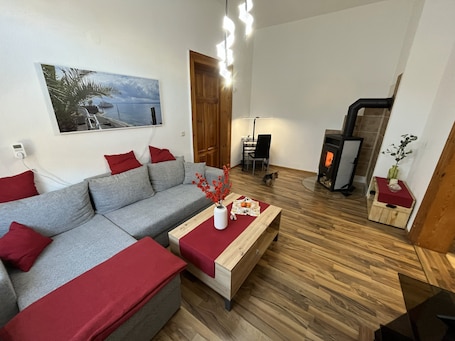 TV, fireplace. Apartment 'Haus Silky' with Private Pool, Garden, and EV Charging Station