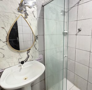 Shower, towels, soap, toilet paper