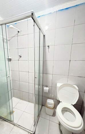 Shower, towels, soap, toilet paper
