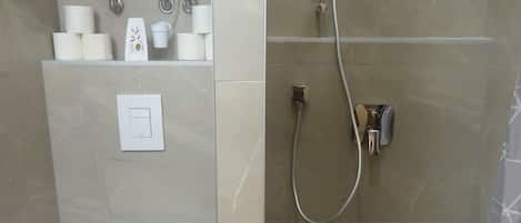 Hair dryer, towels, soap, toilet paper