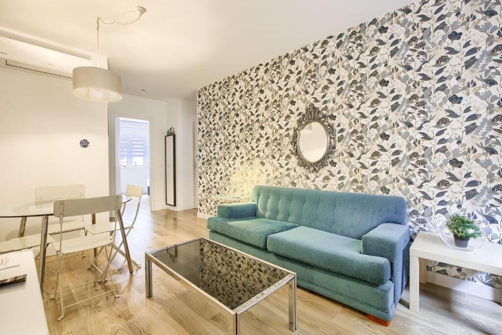 Standard Apartment | Living area | 30-inch Smart TV with digital channels