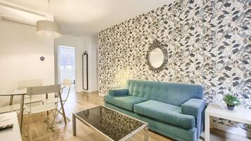 Standard Apartment | Living area | 30-inch Smart TV with digital channels