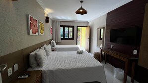 A hotel room with two beds, a TV, and a window with curtains. - POUSADA PORTO MAR (Ipojuca)