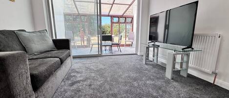 42-inch Smart TV with digital channels, streaming services