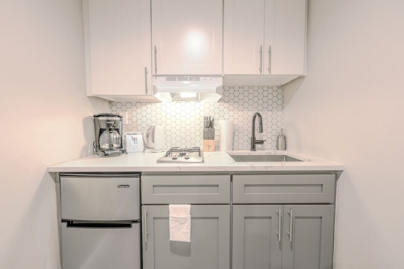 Coffee/tea maker, toaster, cookware/dishes/utensils