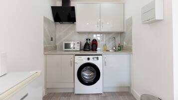 Fridge, microwave, coffee/tea maker, toaster