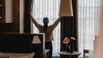 Desk, laptop workspace, blackout drapes, soundproofing