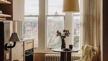 Premium bedding, pillowtop beds, laptop workspace, blackout drapes