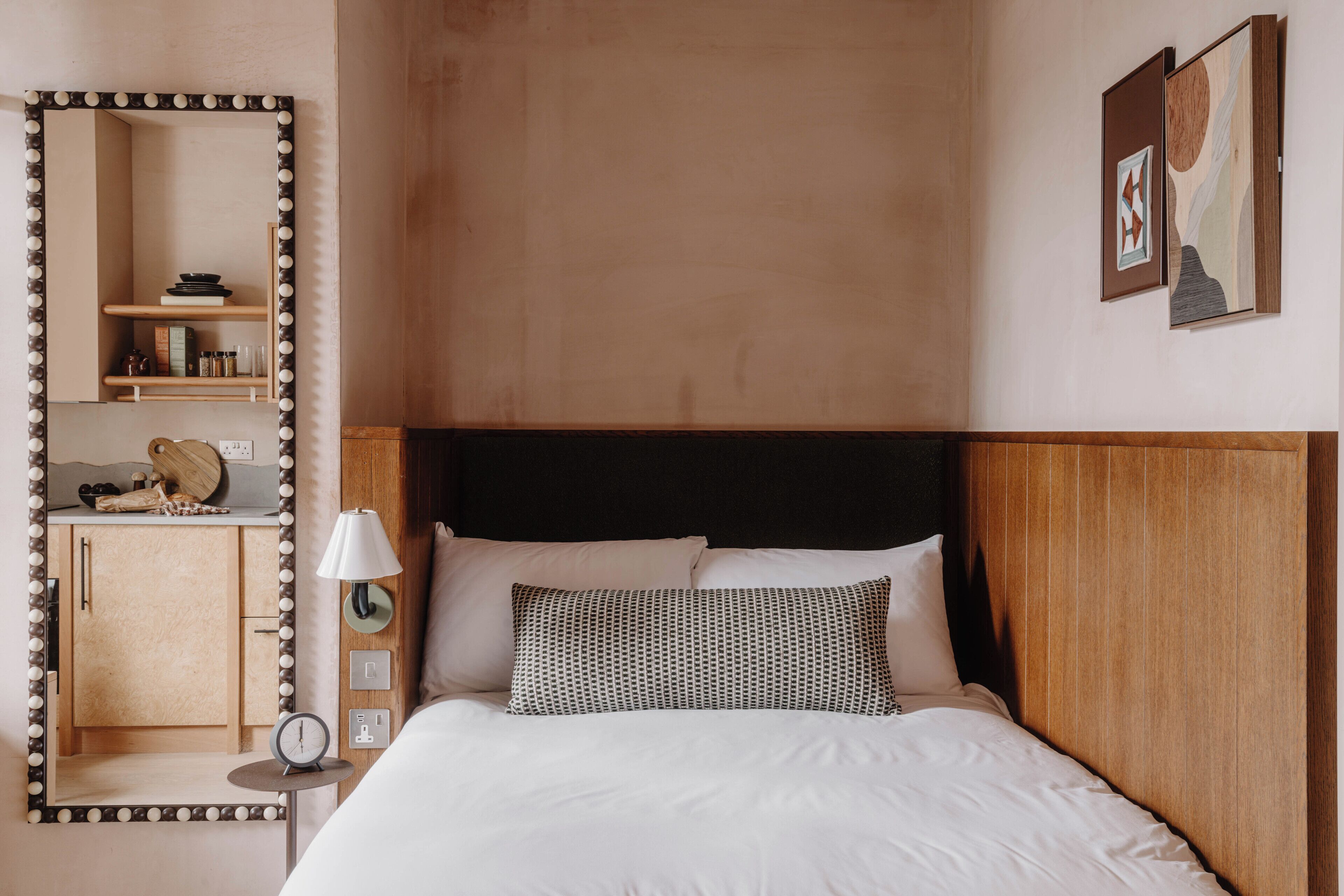 Premium bedding, pillowtop beds, laptop workspace, blackout drapes